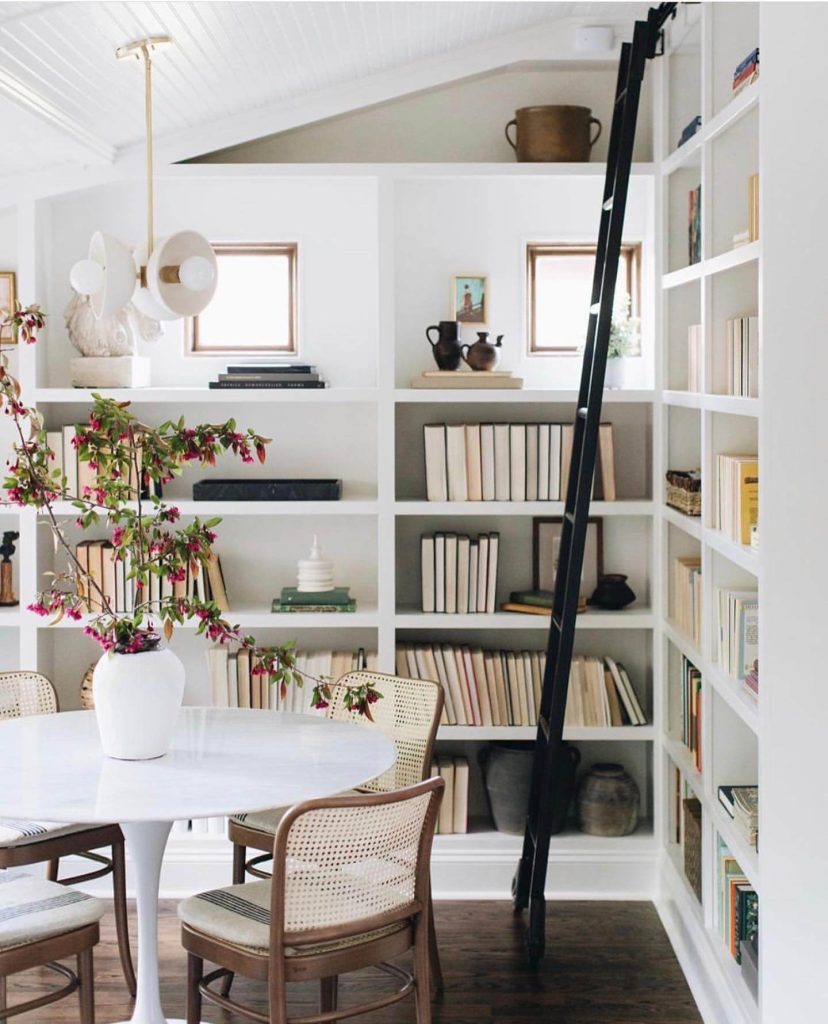 Elegant Dining Room Library with Ladder Access