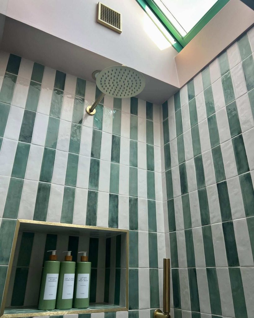 22. Vertical Striped Tiles for a Tall, Fresh Look