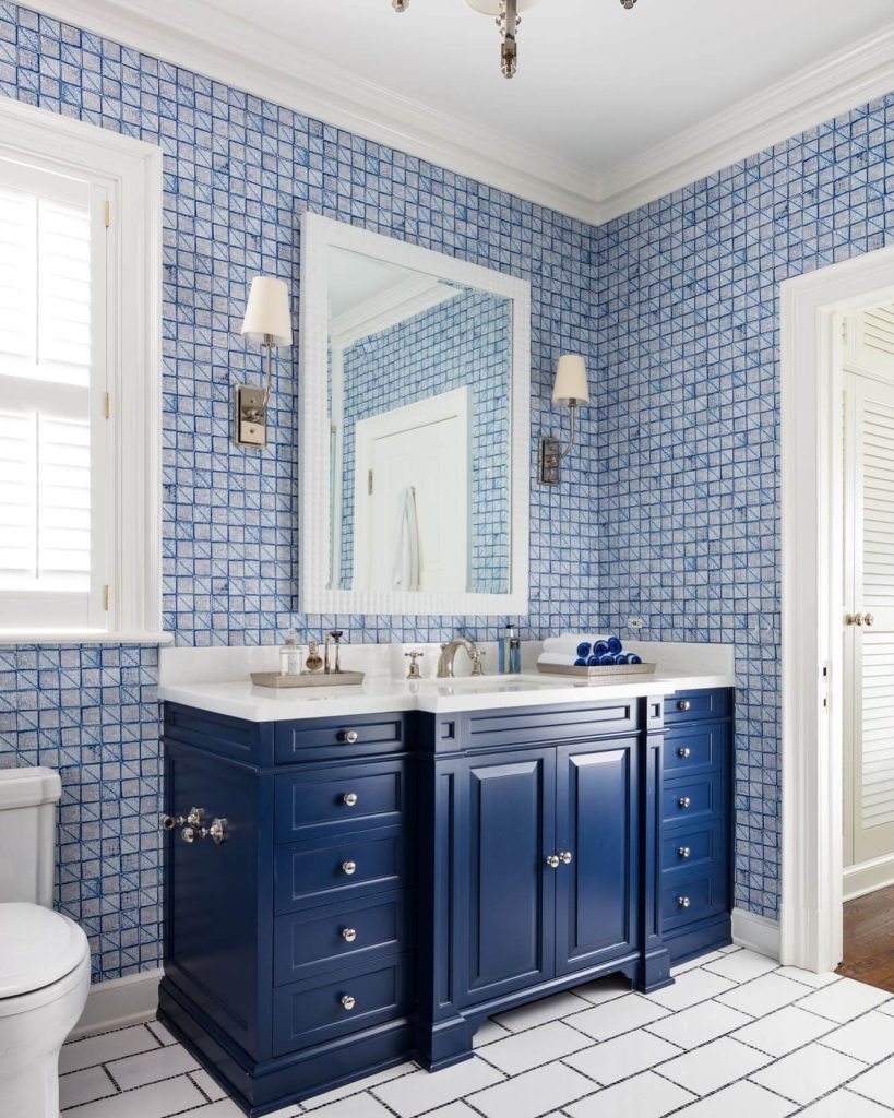 21. Classic Navy Elegance with Geometric Wall Detail