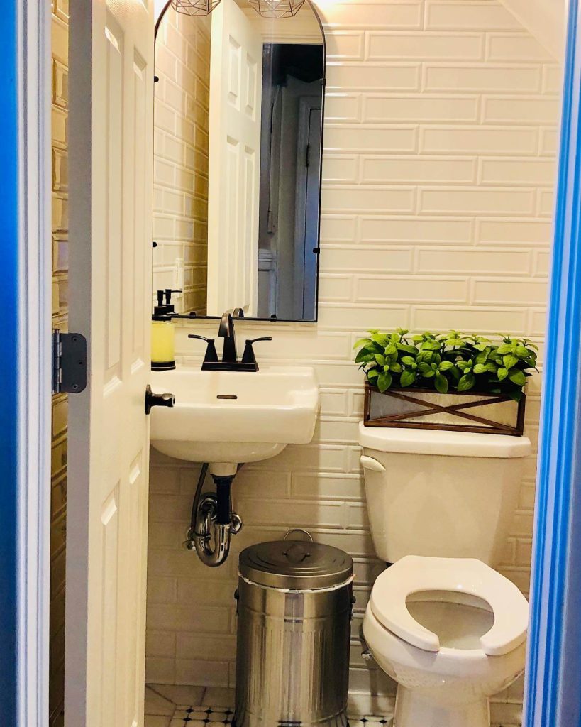 18. Tiny Yet Timeless Powder Room