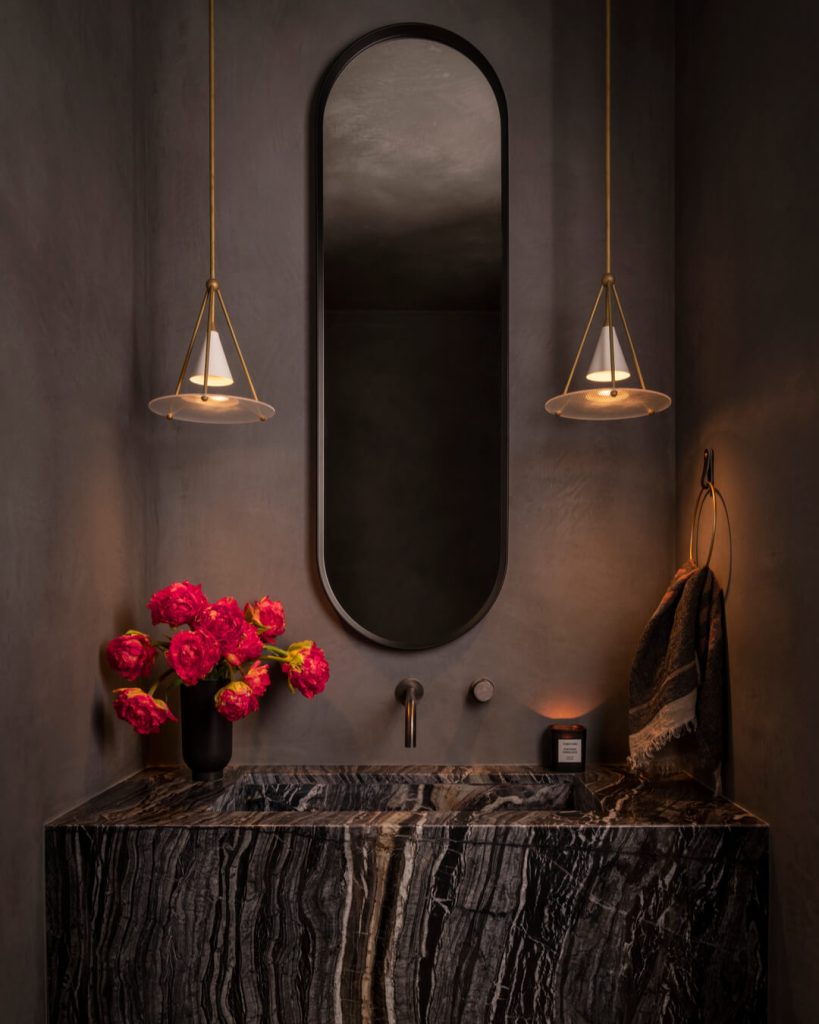 Bold Dark Marble Vanity in a Moody Space