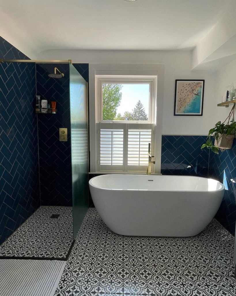 Bright Blue Bathroom with Geometric Tiles and Soft Tones