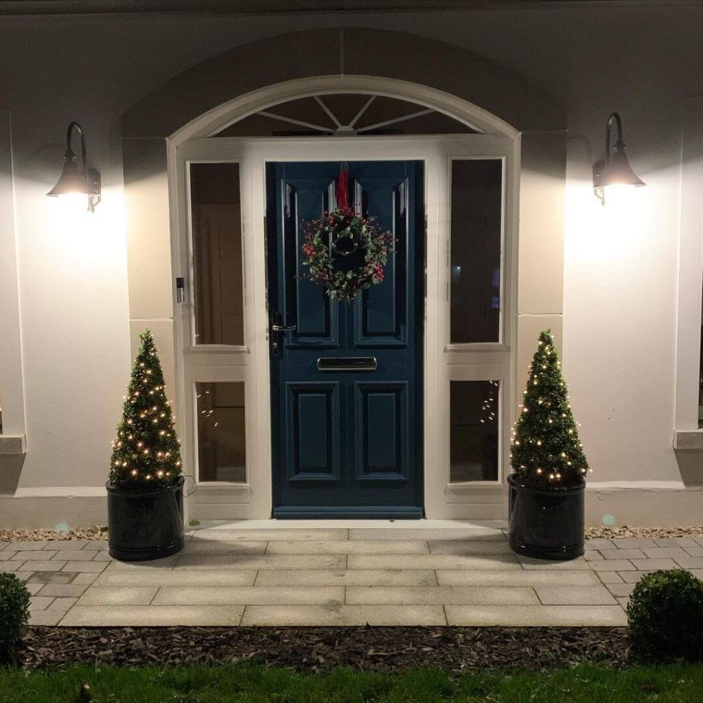 Classic Blue Door with Twinkling Trees