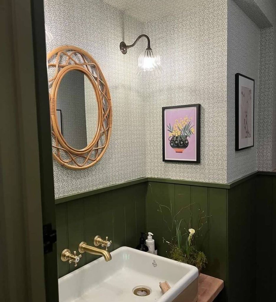 Classic Green and White Bathroom with Unique Wall Art