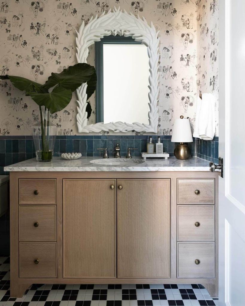 Classic Vanity with Leafy Accents and Artistic Mirror