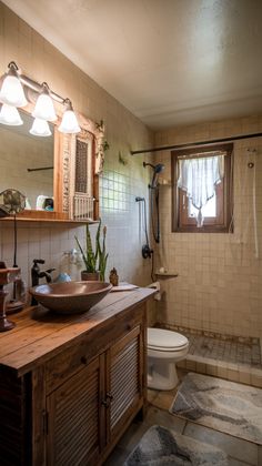 Compact Rustic Bathroom with Wooden Vanity