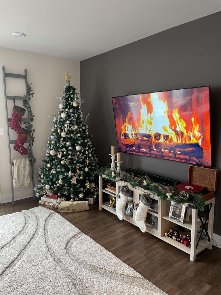 Cozy Fireplace and Christmas Tree TV Stand Decor