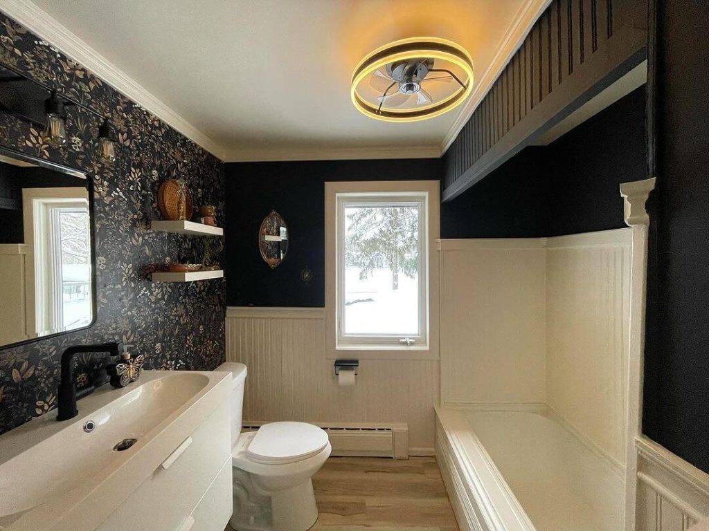 Dark Floral and Cream Wainscoting in a Cozy Powder Room