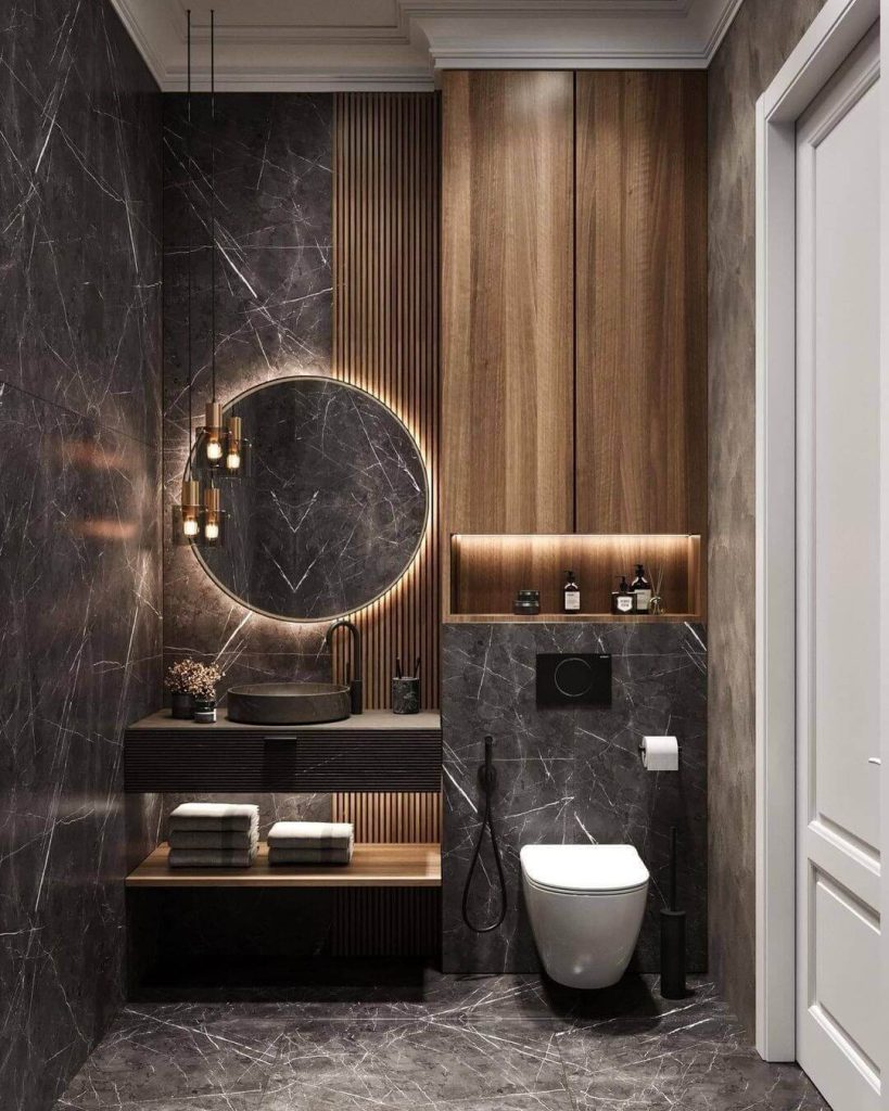 Dark Marble Bathroom with Round Mirror