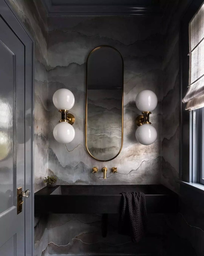 Dark and Elegant Guest Bathroom with Gold Accents