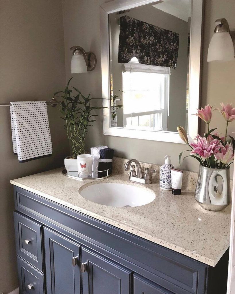 Elegant Blue and Beige Bathroom Counter Decor