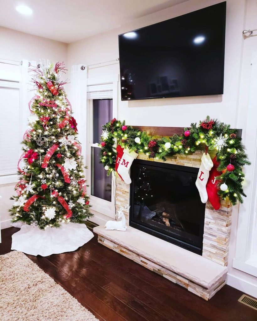 Elegant Christmas Tree and Fireplace Setup