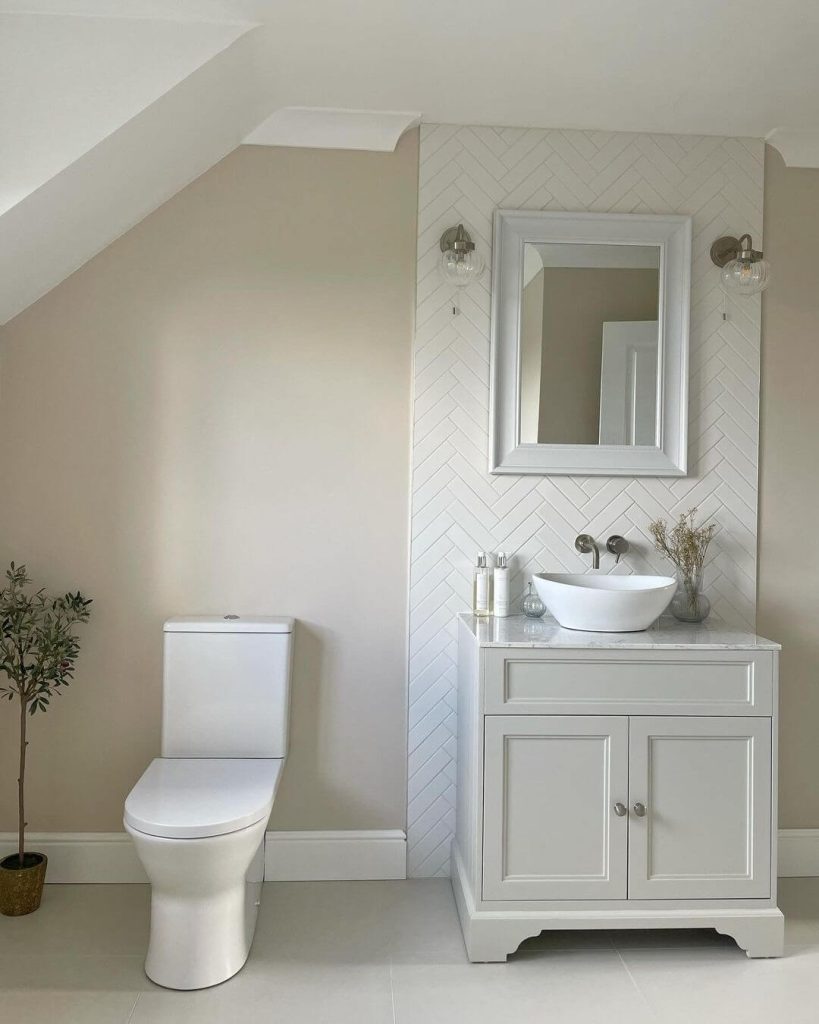 Elegant Gray Vanity with Chevron Tiles