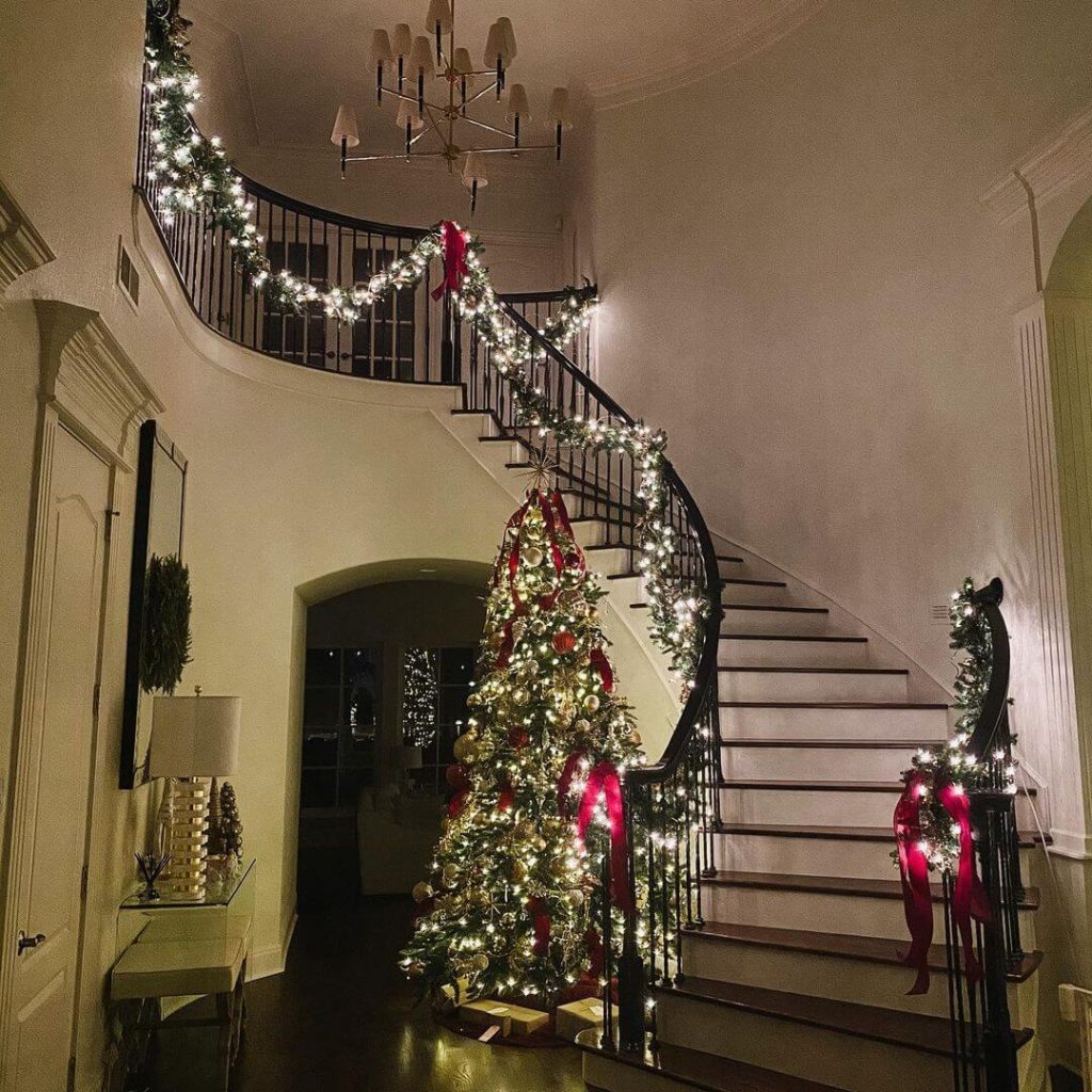 Elegant Holiday Staircase with Garland and Lights