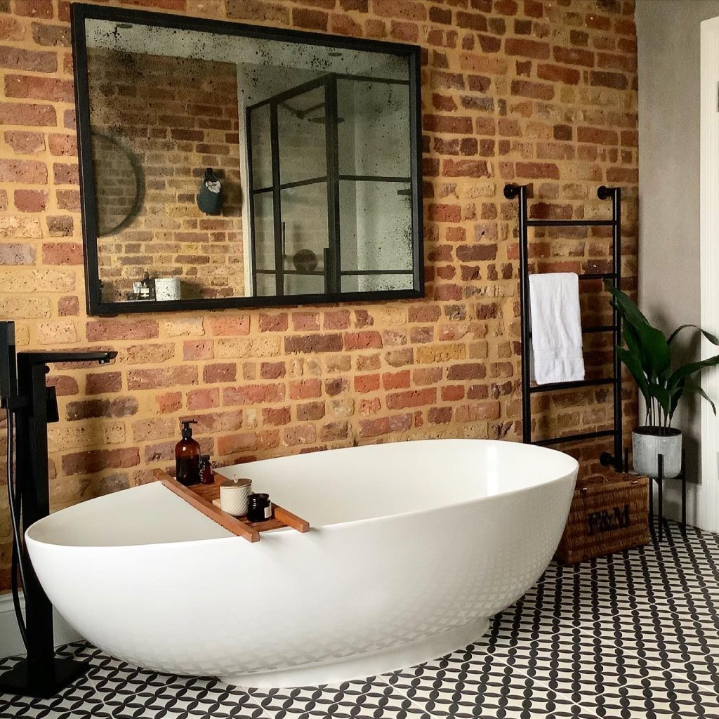 Exposed Brick Wall Industrial Bathroom