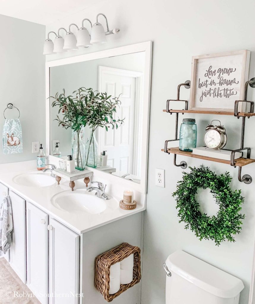 Farmhouse-Inspired Bathroom Decor with Greenery and Quotes