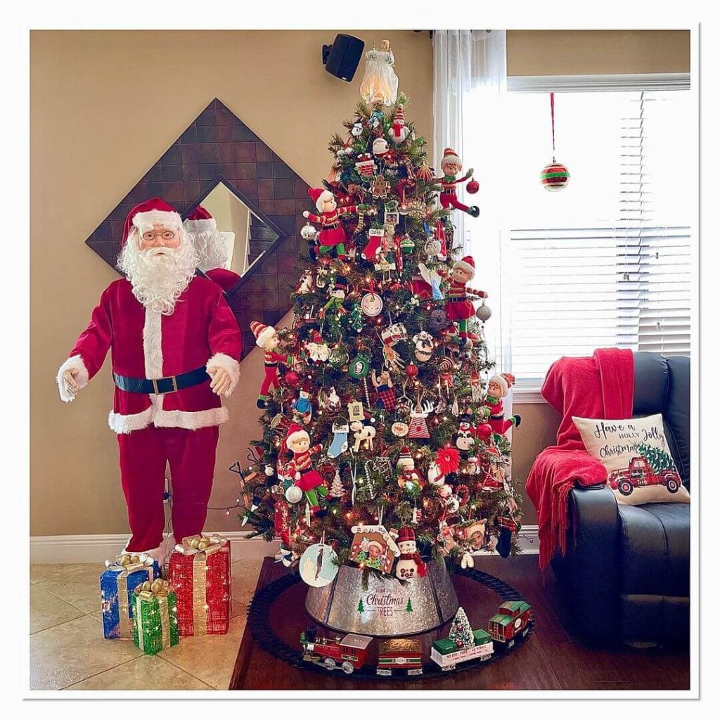 Festive Santa and Traditional Christmas Tree Display