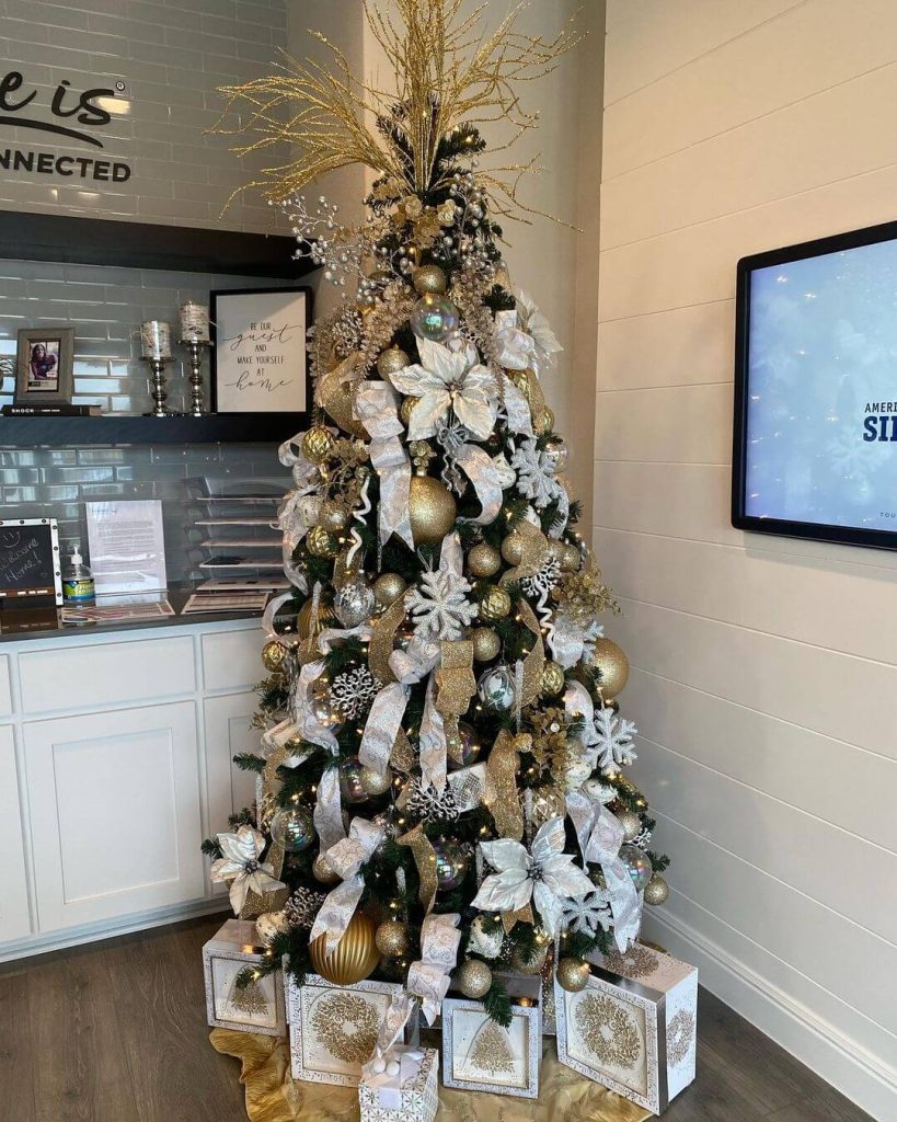 Luxurious Black, Gold, and White Holiday Tree with Gift Boxes