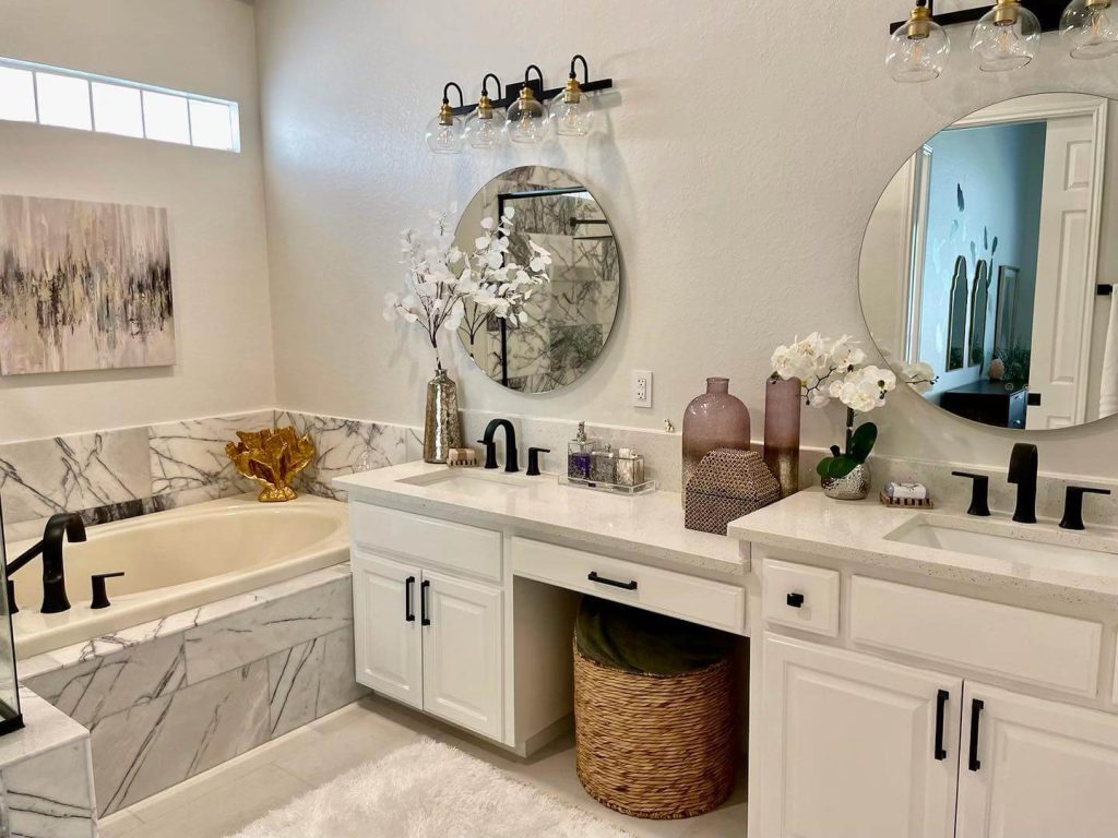 Marble Vanity with Dual Mirrors and Subtle Decor