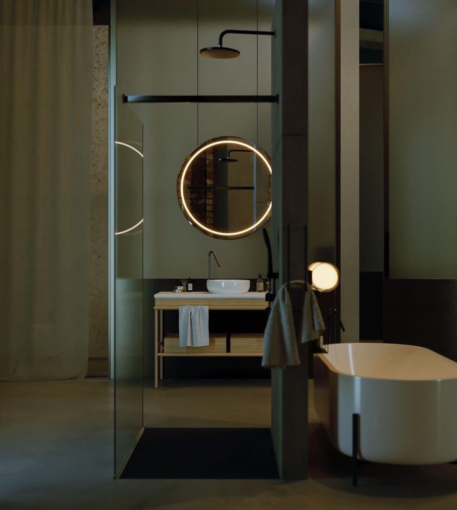 Minimalist Industrial Bathroom with Dramatic Lighting