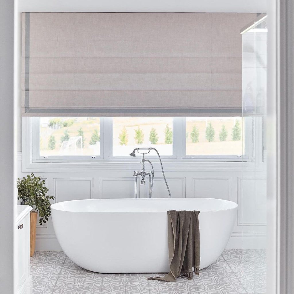 Minimalist White Wainscoting for a Serene Bath