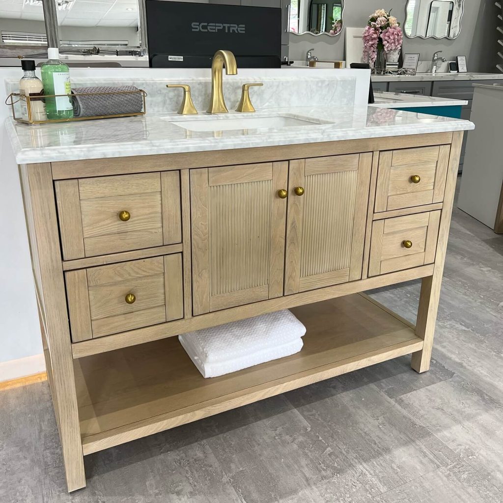 Natural Wood Vanity with Gold Fixtures