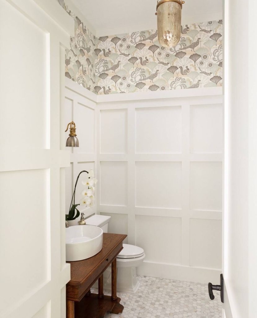 Playful White Panel Wainscoting with Patterned Wallpaper