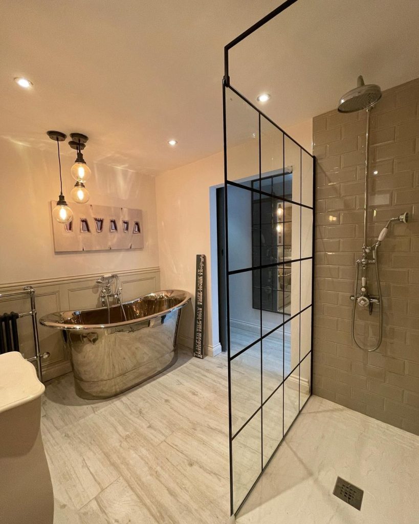 Polished Chrome and Glass Industrial Bathroom