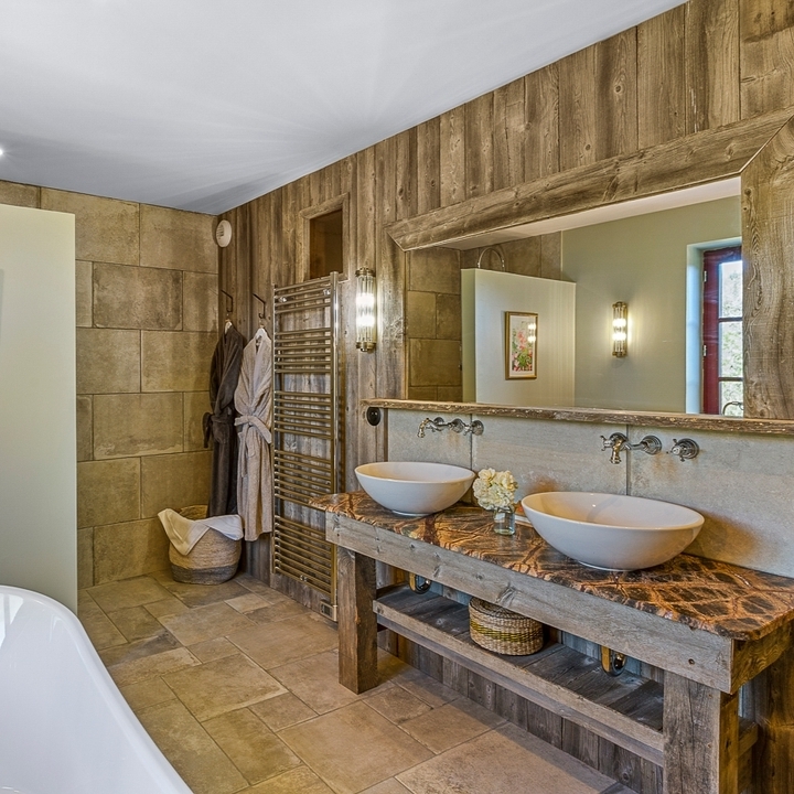 Rustic Double Vanity with Natural Stone and Wood Accents