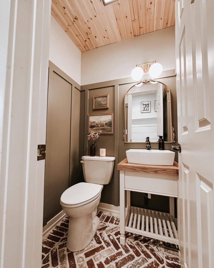 Rustic-Inspired Powder Room with Brick Flooring