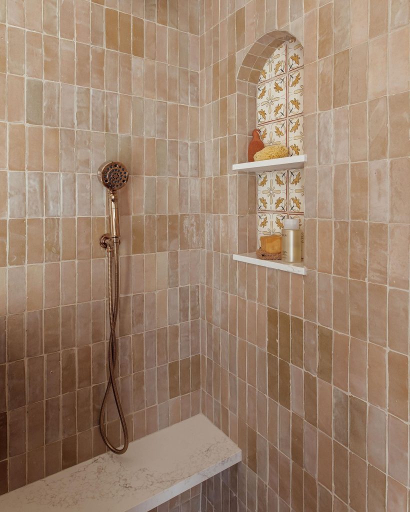 Rustic Terracotta Shower Tiles with Decorative Inset