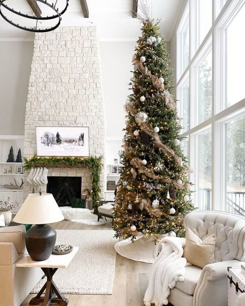 Tall Christmas Tree by the Fireplace