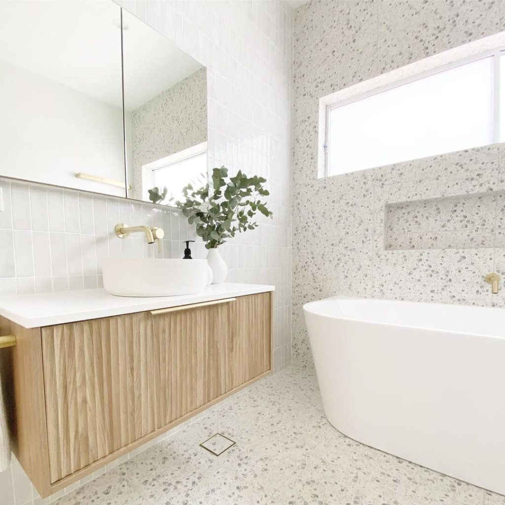 Terrazzo Coastal Retreat with Light Wood Vanity