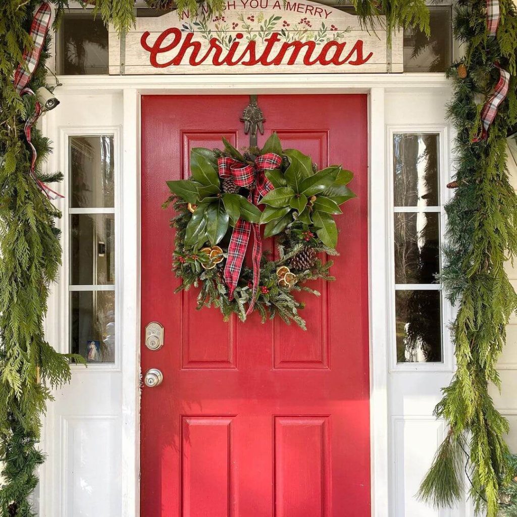 Traditional Red Door with Greenery and Plaid Accents