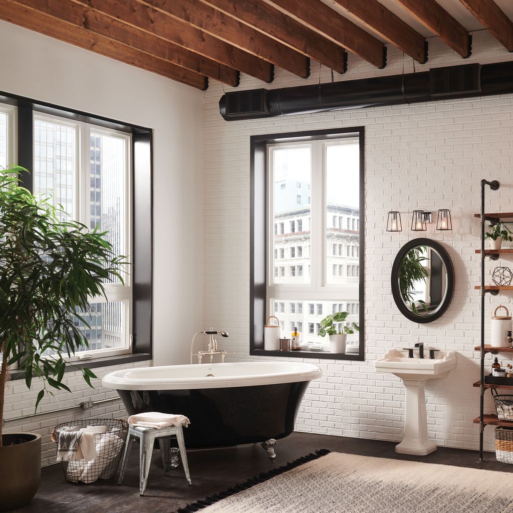 Urban Industrial Bathroom with Black Clawfoot Tub