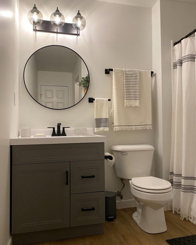 Bold Modern Bathroom with Black and Marble Details