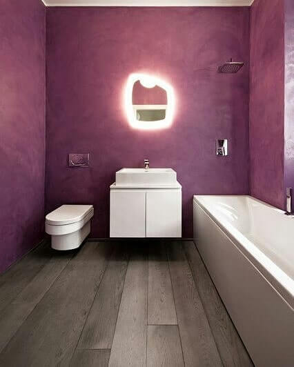 Bold Purple Bathroom with Artistic Lighting