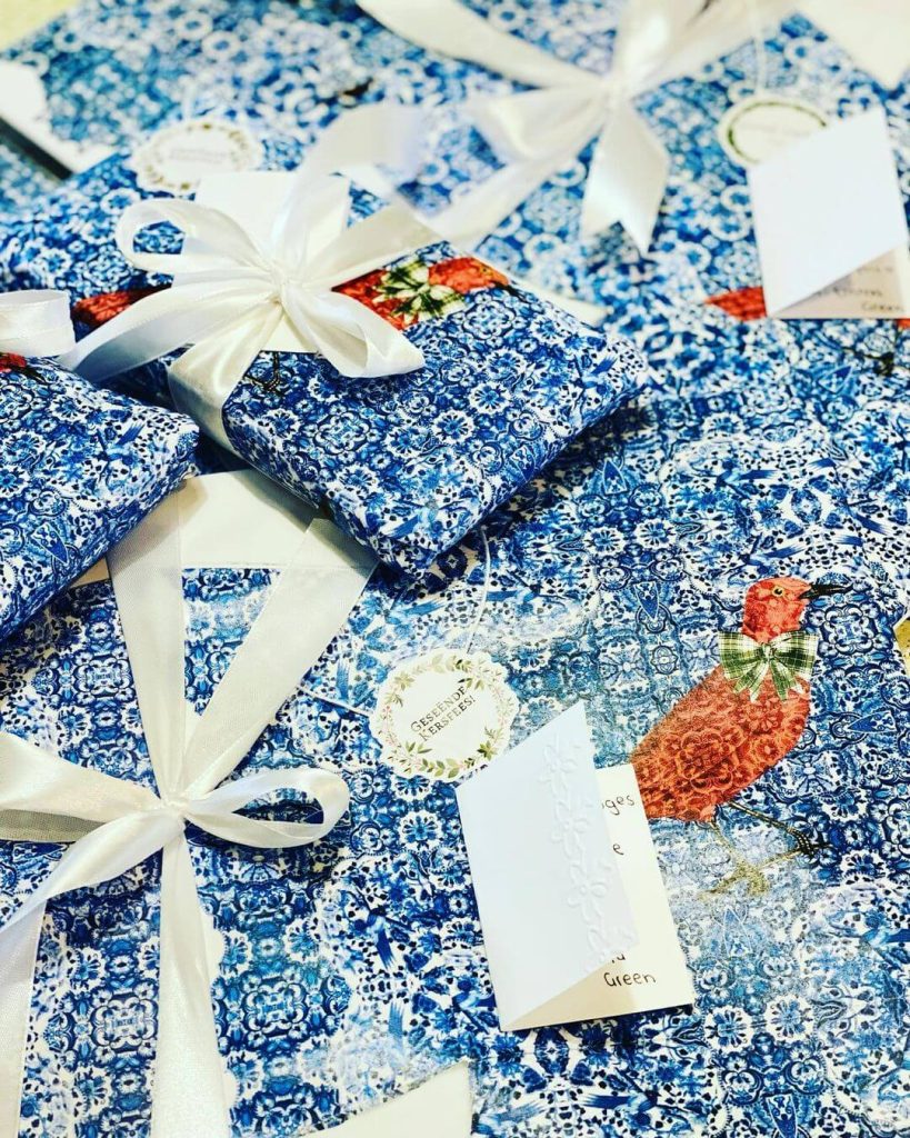 Festive Blue and White Gift Wrap with Ornamental Detail