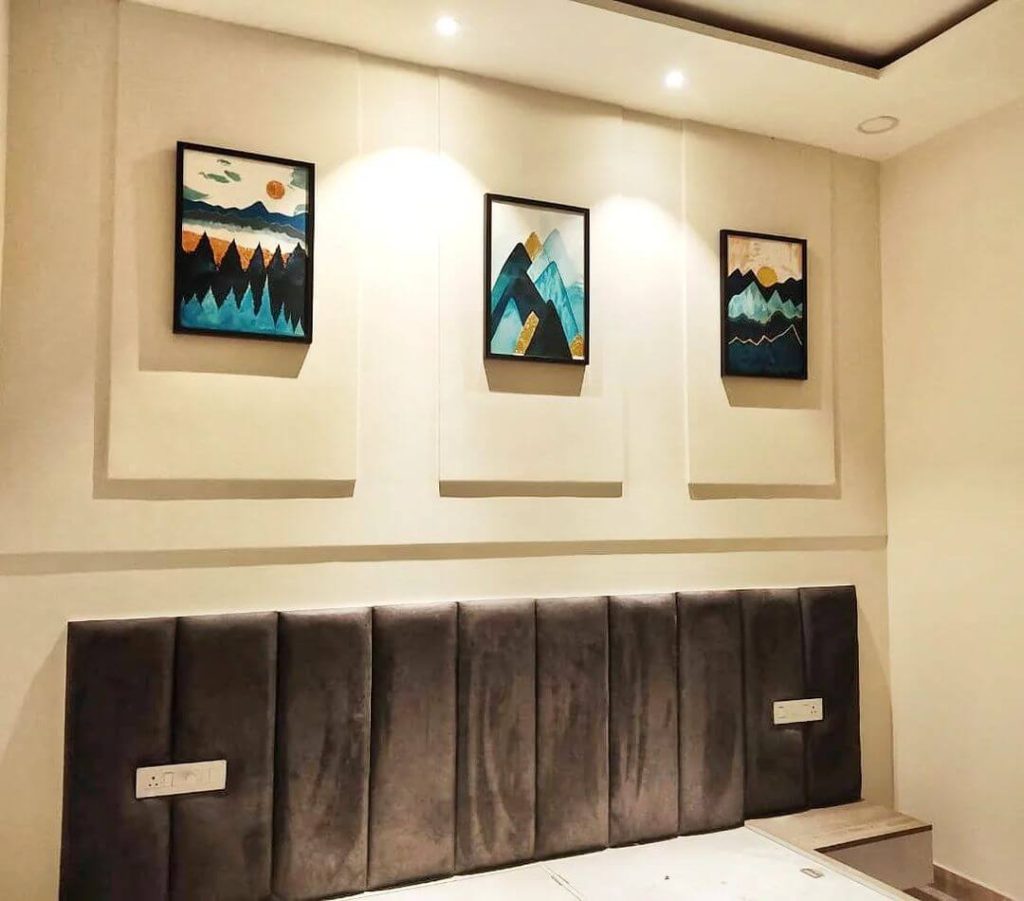 Framed Abstract Art Above Bed with Accent Lighting