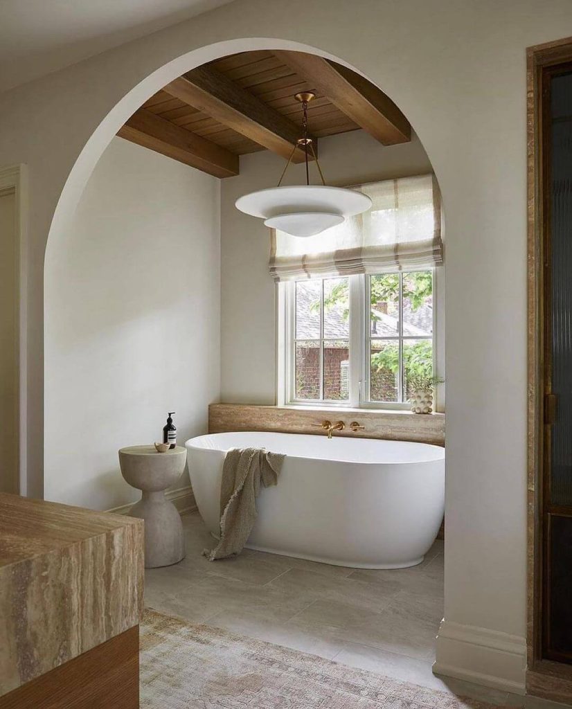 Minimalist Master Bathroom with Freestanding Tub and Arched Ceiling