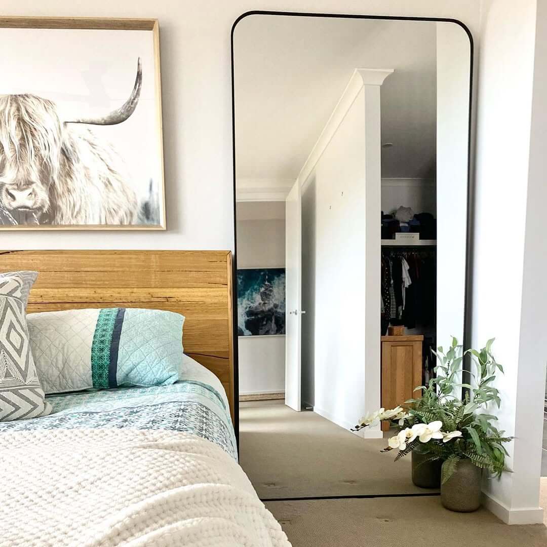 How to Incorporate a Bedroom Floor Mirror into Your Decor
