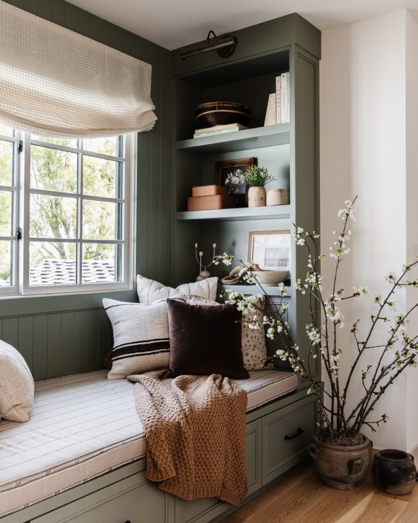 8. Bright and Cozy Staircase Reading Nook