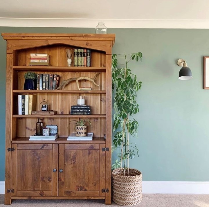 9. Showcase Wood Accents with an Antique Hutch