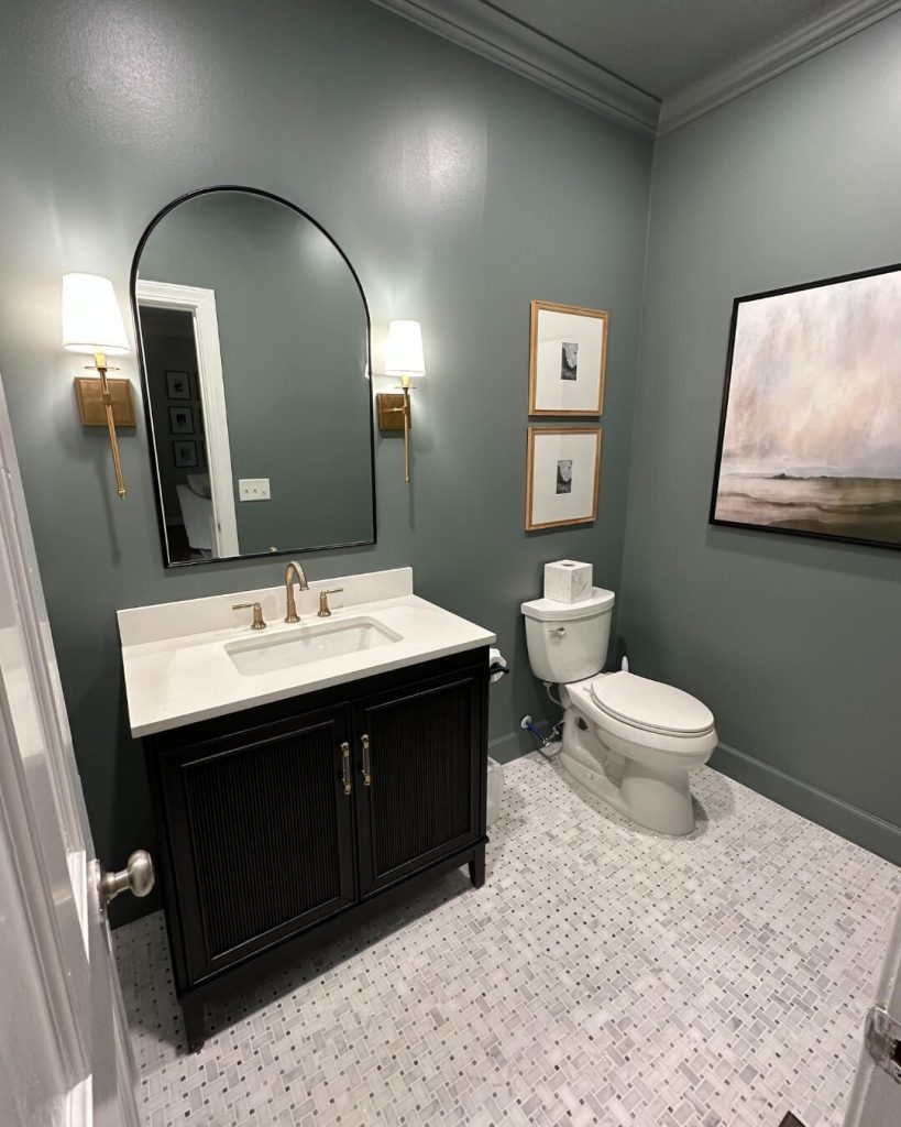 10. Moody Green Walls and Sophisticated Accents