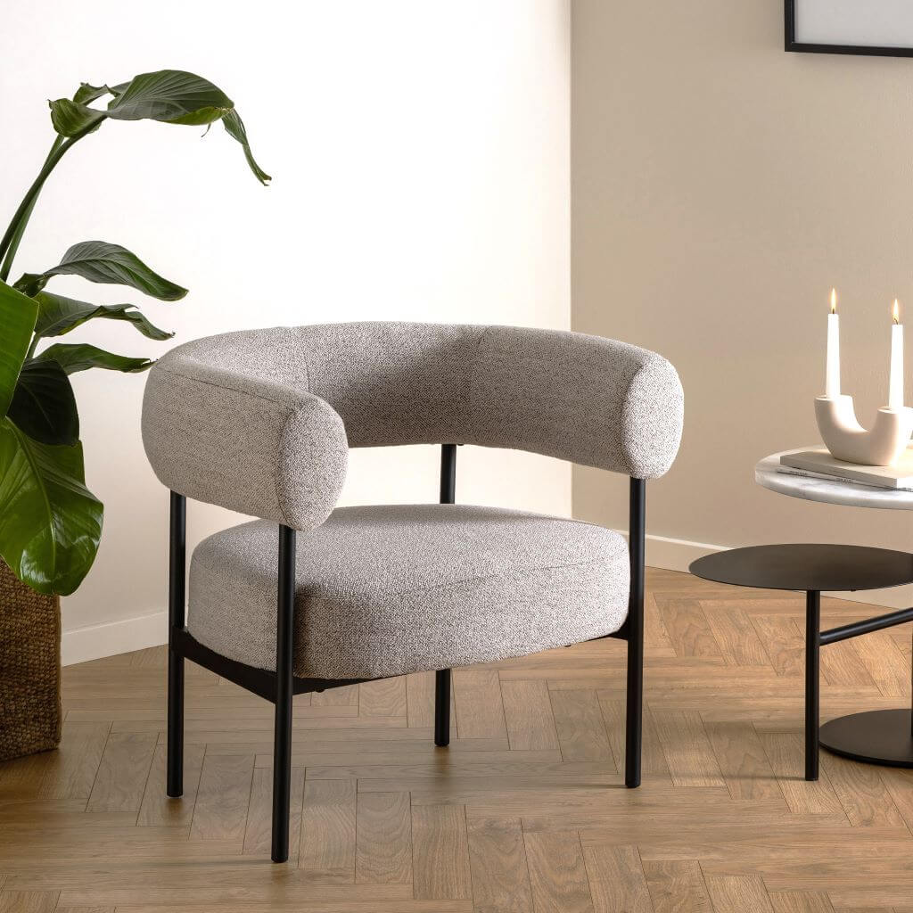 10. Sculptural Bouclé Chair for Contemporary Cool