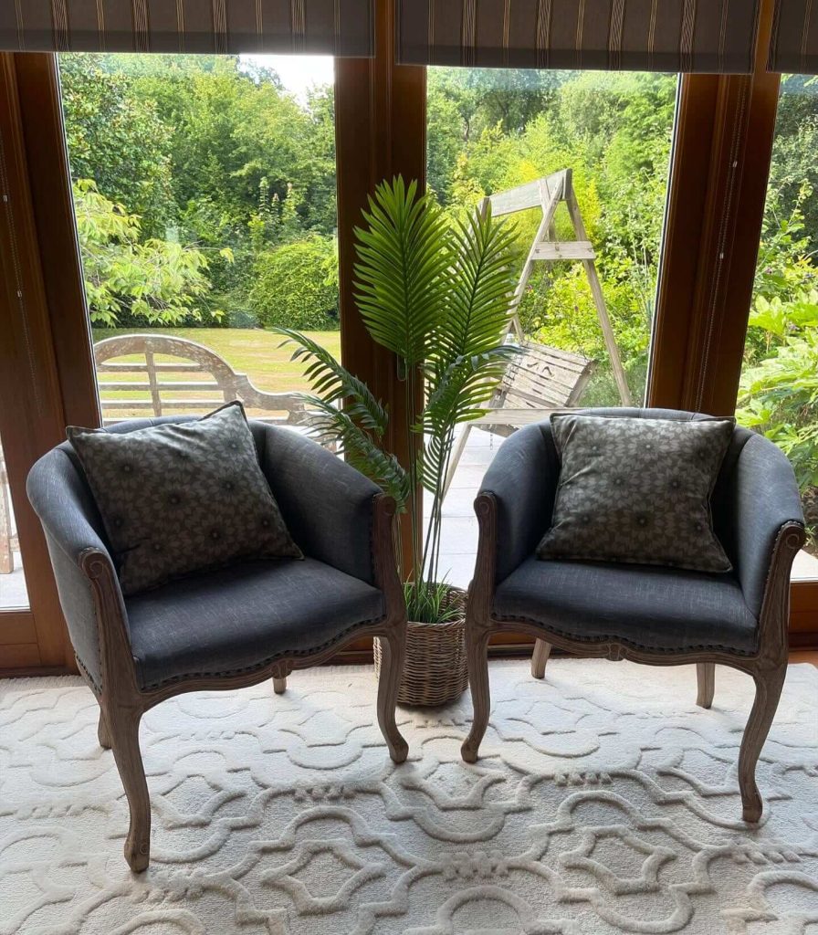 11. Rustic Charm with French Country Armchairs