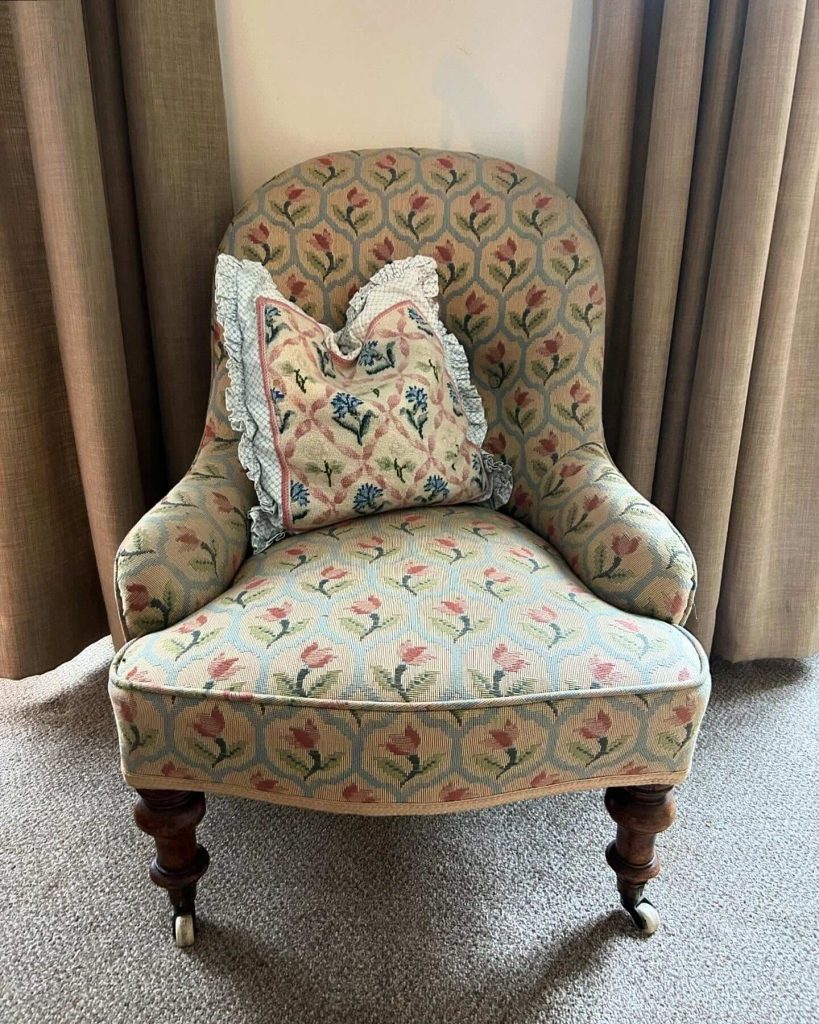 12. Floral Upholstered Chair for English Cottage Vibes