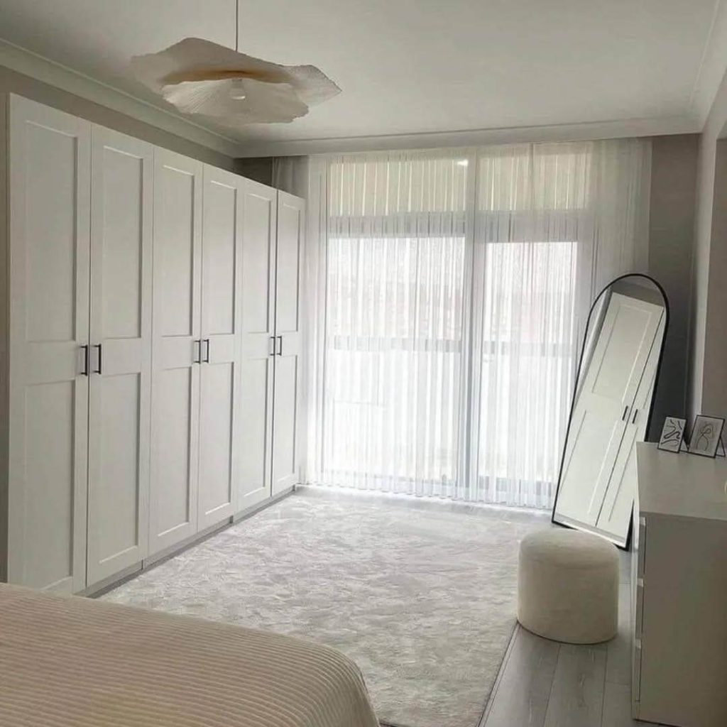 13. Lean Into Minimalism with a Slim Arched Mirror