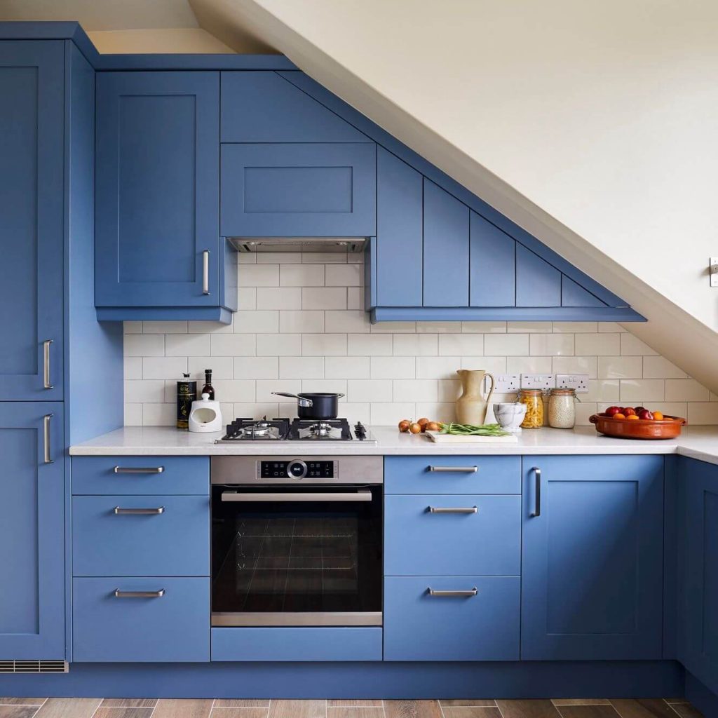 13. Maximize Small Spaces with Clever Blue Cabinetry