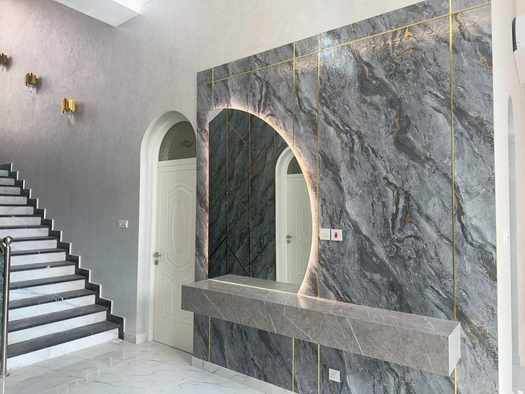 14. Modern Marble and Mirror Wall with LED Accents